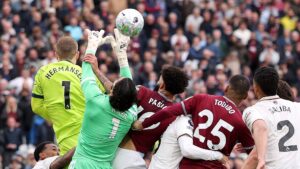 Pablo grabs the arm of David Raya before Callum Wilson (not pictured) scores a goal that is later disallowed by VAR