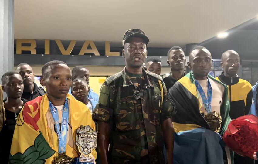 Tanzanian JKT athletes being welcomed at Kilimanjaro International Airport after their victory at the Maratona FMO marathon in Brazil.
