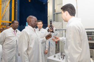 yan President William Ruto touring an industrial production plant alongside Kenyan and Kazakhstani trade officials in Astana.
